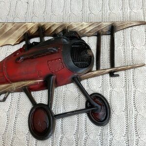 Vintage 60s Airplane Metal wall decor. 20” wide 9” top to bottom